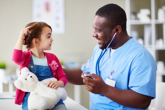 Doctor with pediatric patient
